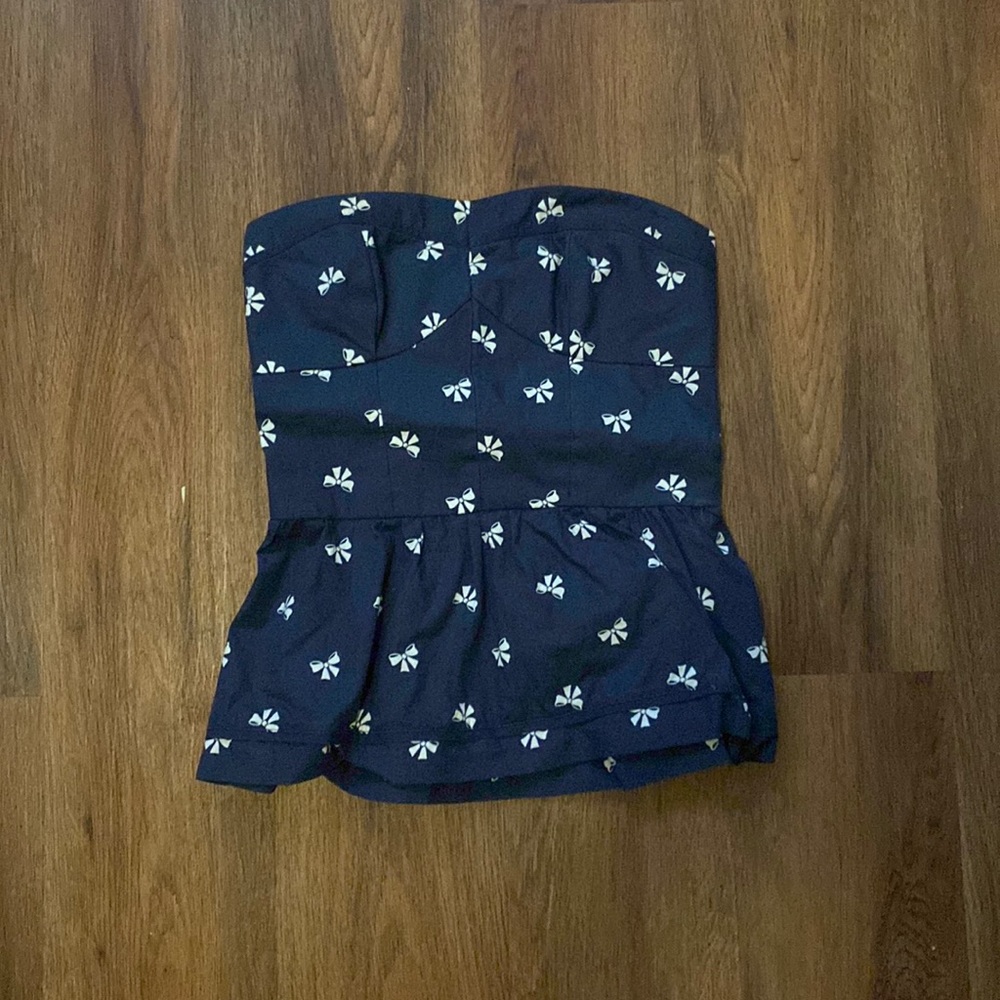 Strapless navy blue top with bow design